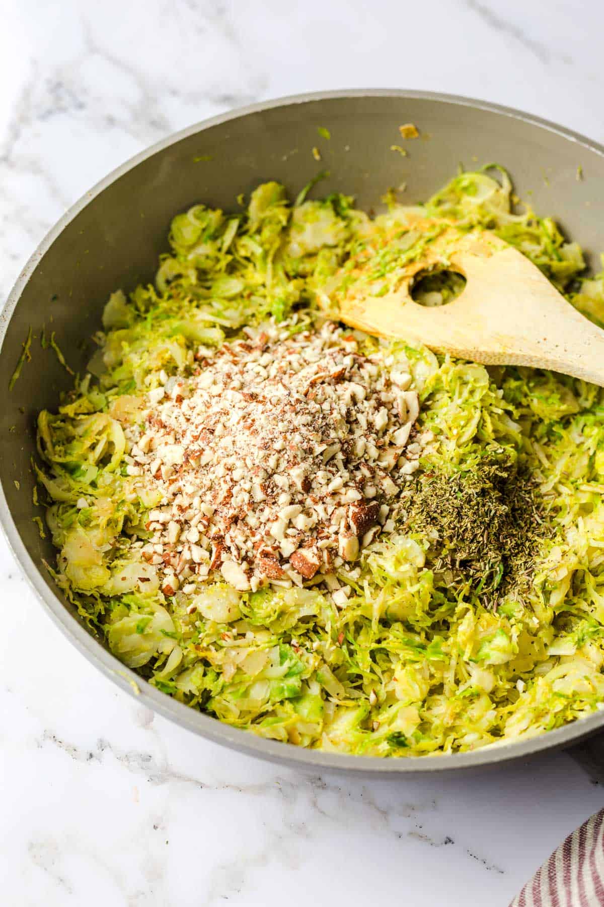 cooked shredded brussels sprouts with almond meal