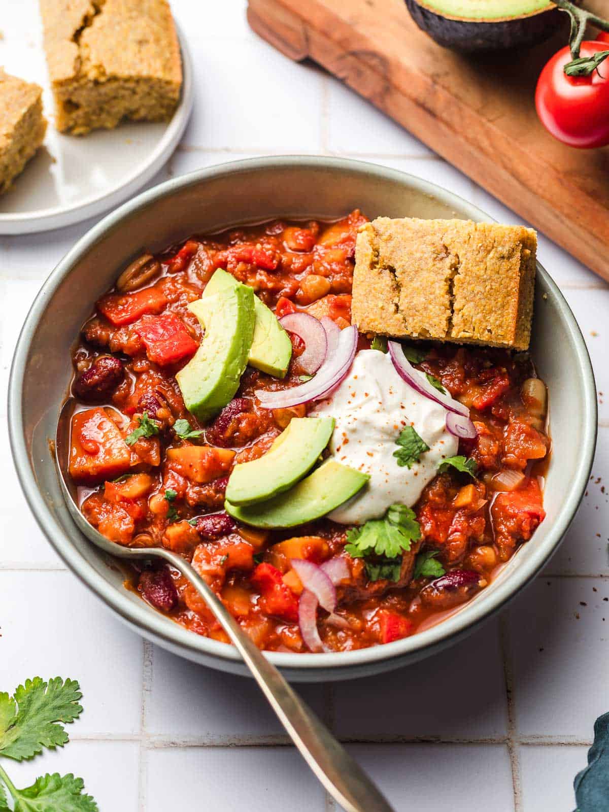vegetarian chili with cornbread and avocado