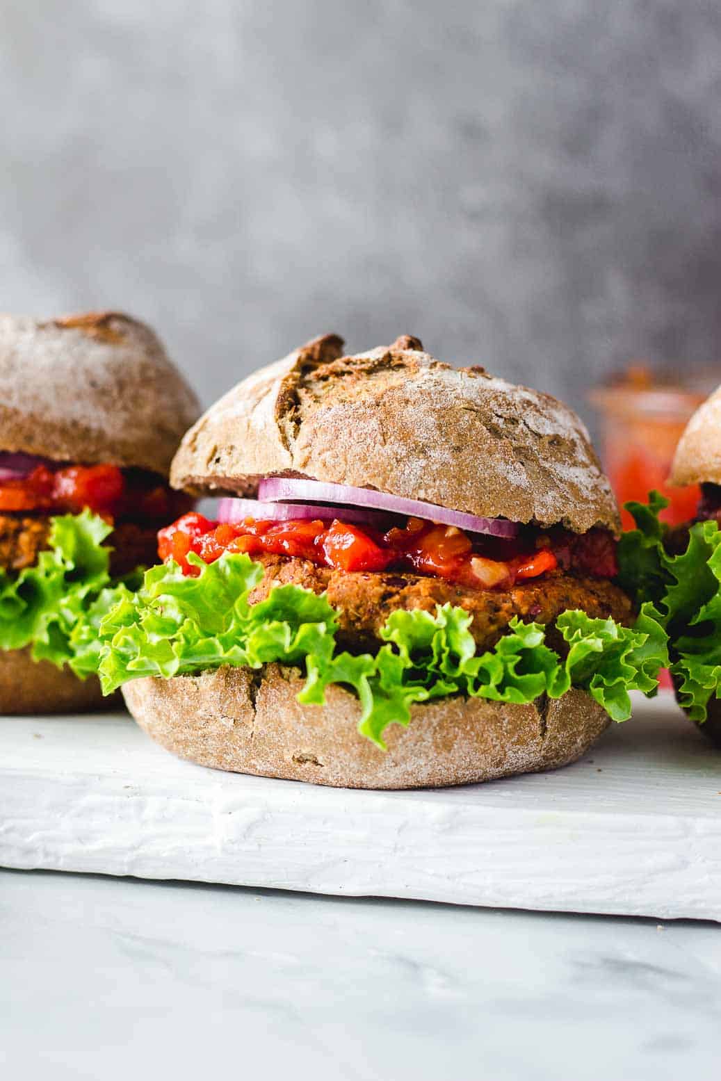 Wholesome Veggie Burgers with Red Pepper Sauce #vegan #burger