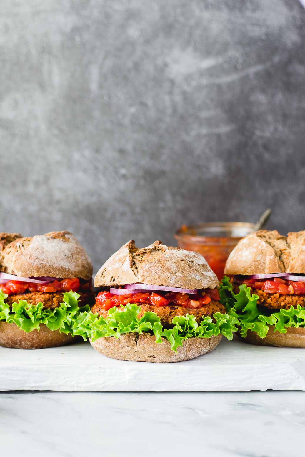 Wholesome Veggie Burgers with Red Pepper Sauce #vegan #burger