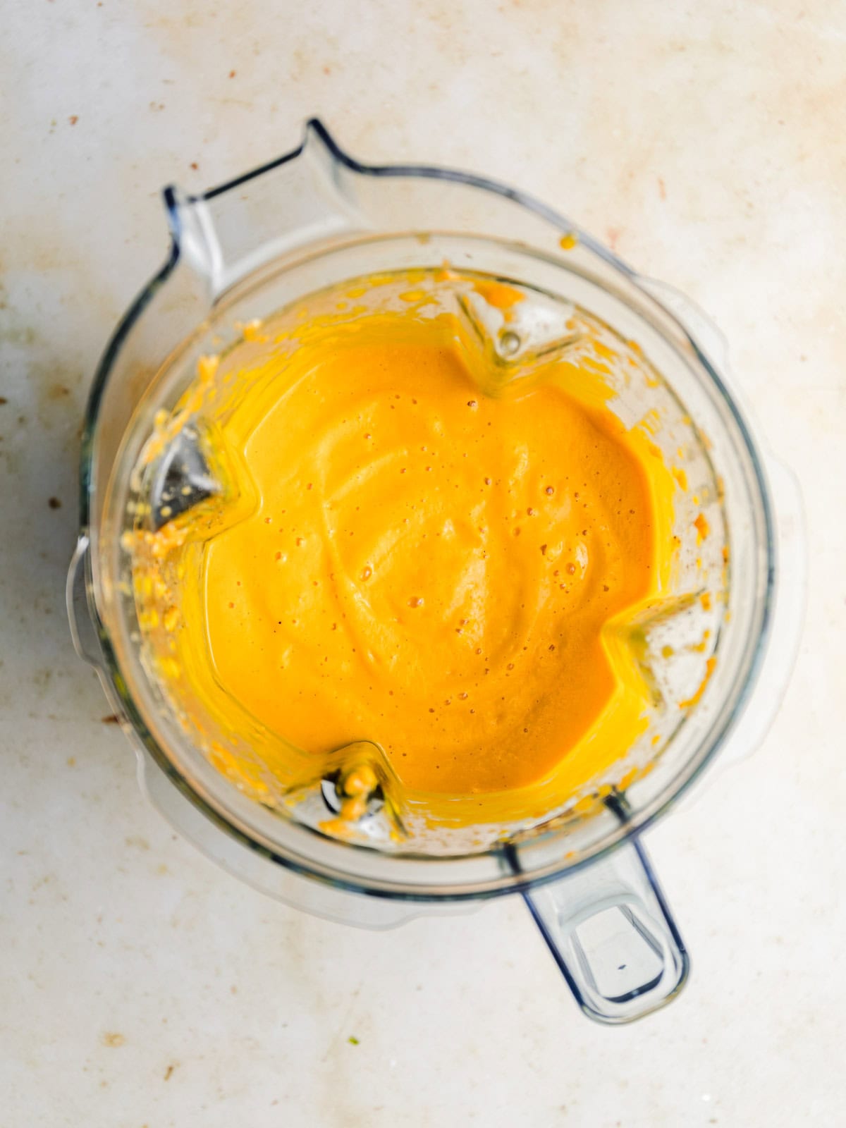 creamy vegan carrot and ginger soup with apple and cashews