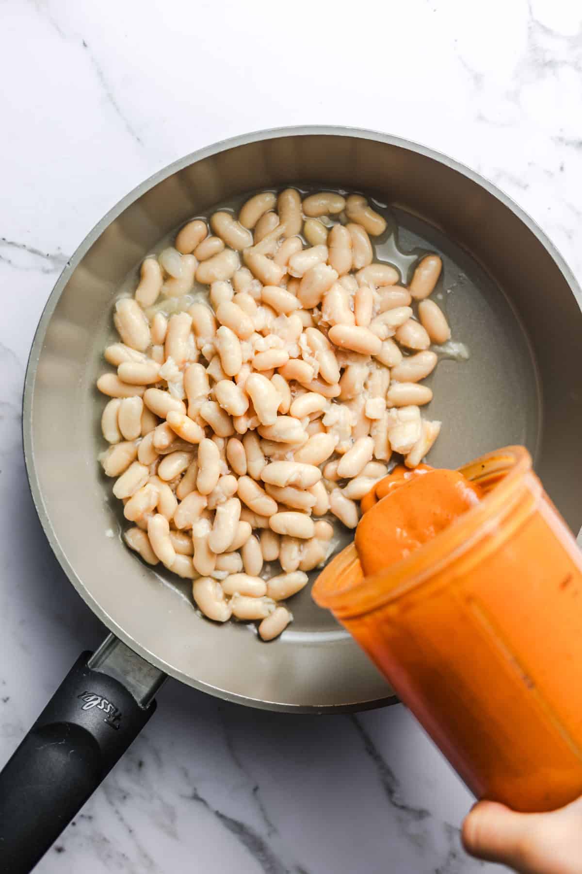 cooking wthite beans in creamy sauce