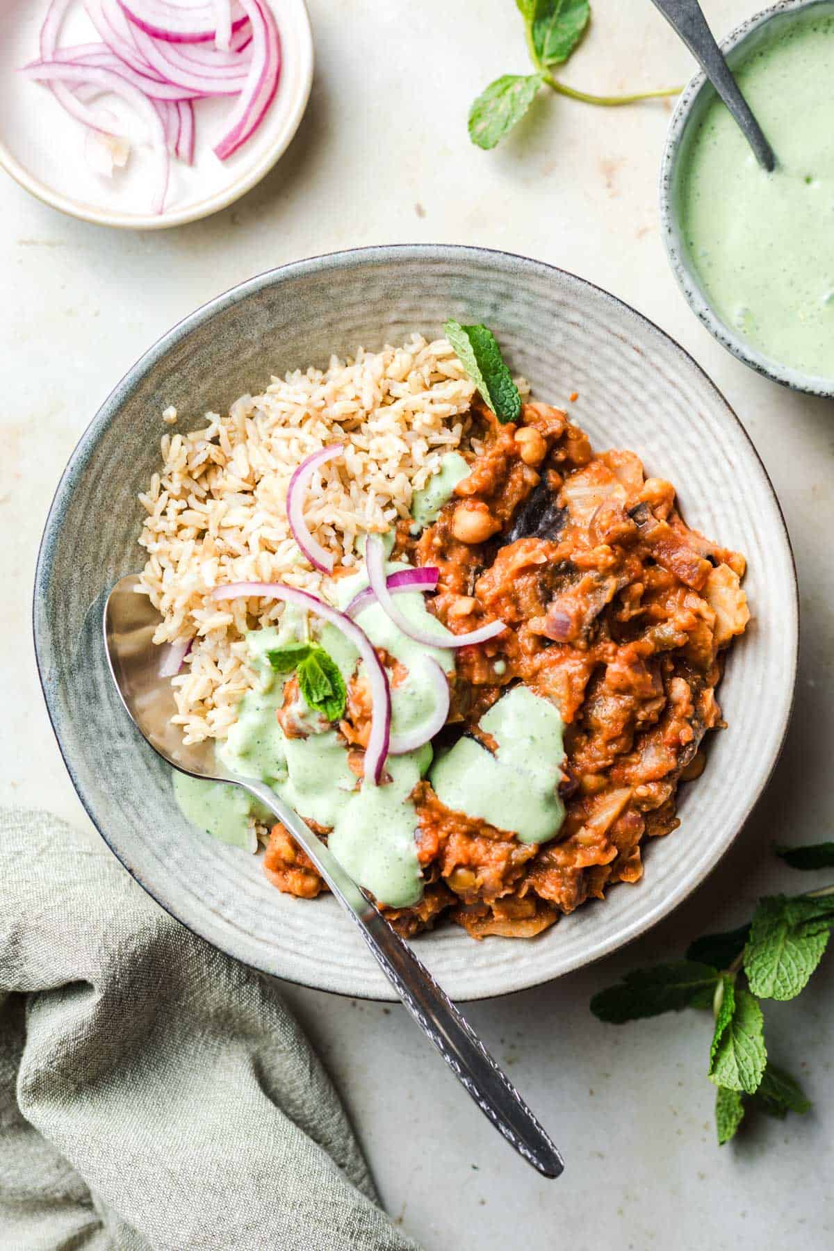 vegetarian aubergine chickpea stew with mint yogurt sauce