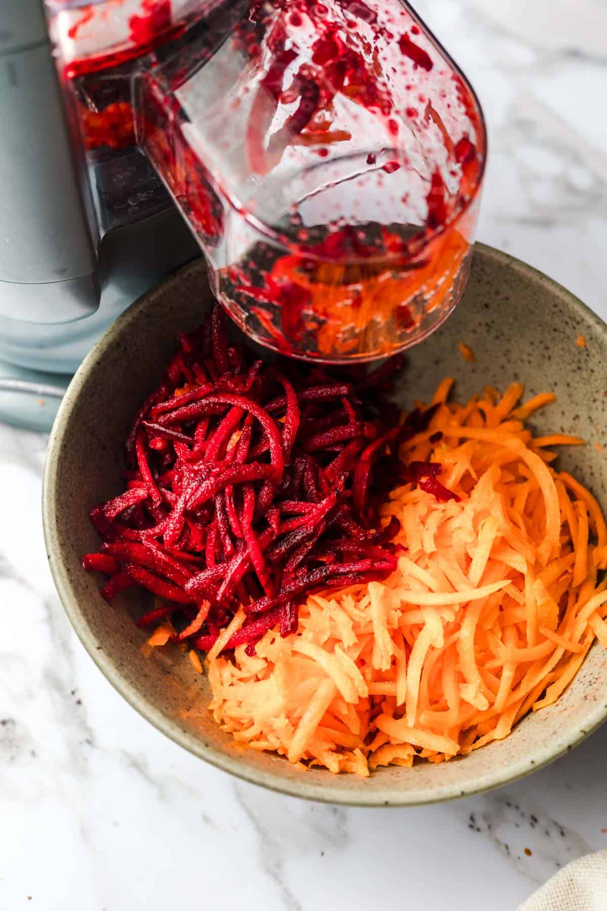 shredded carrots and beets in bowl