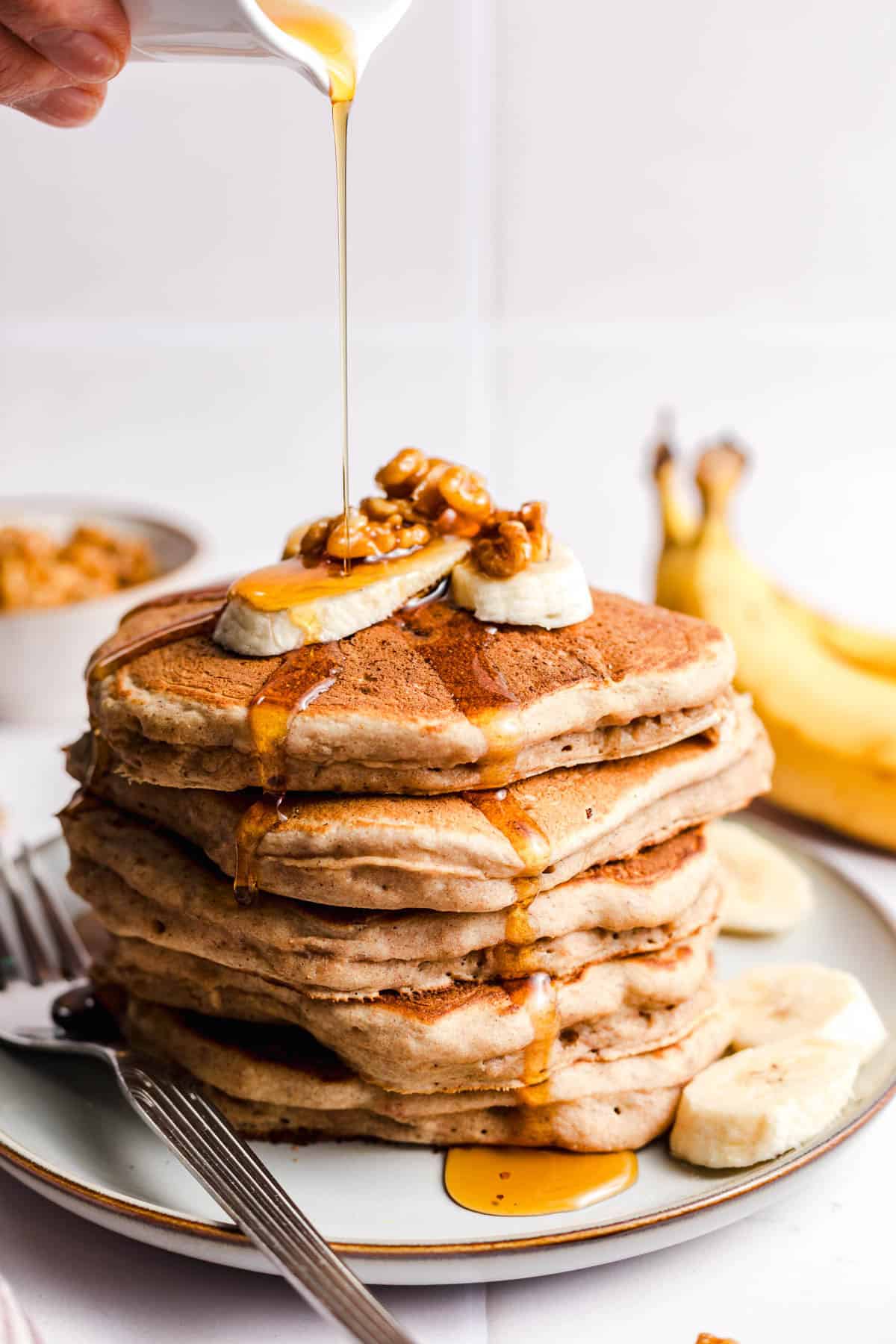 fluffy vegan pancakes with maple syrup