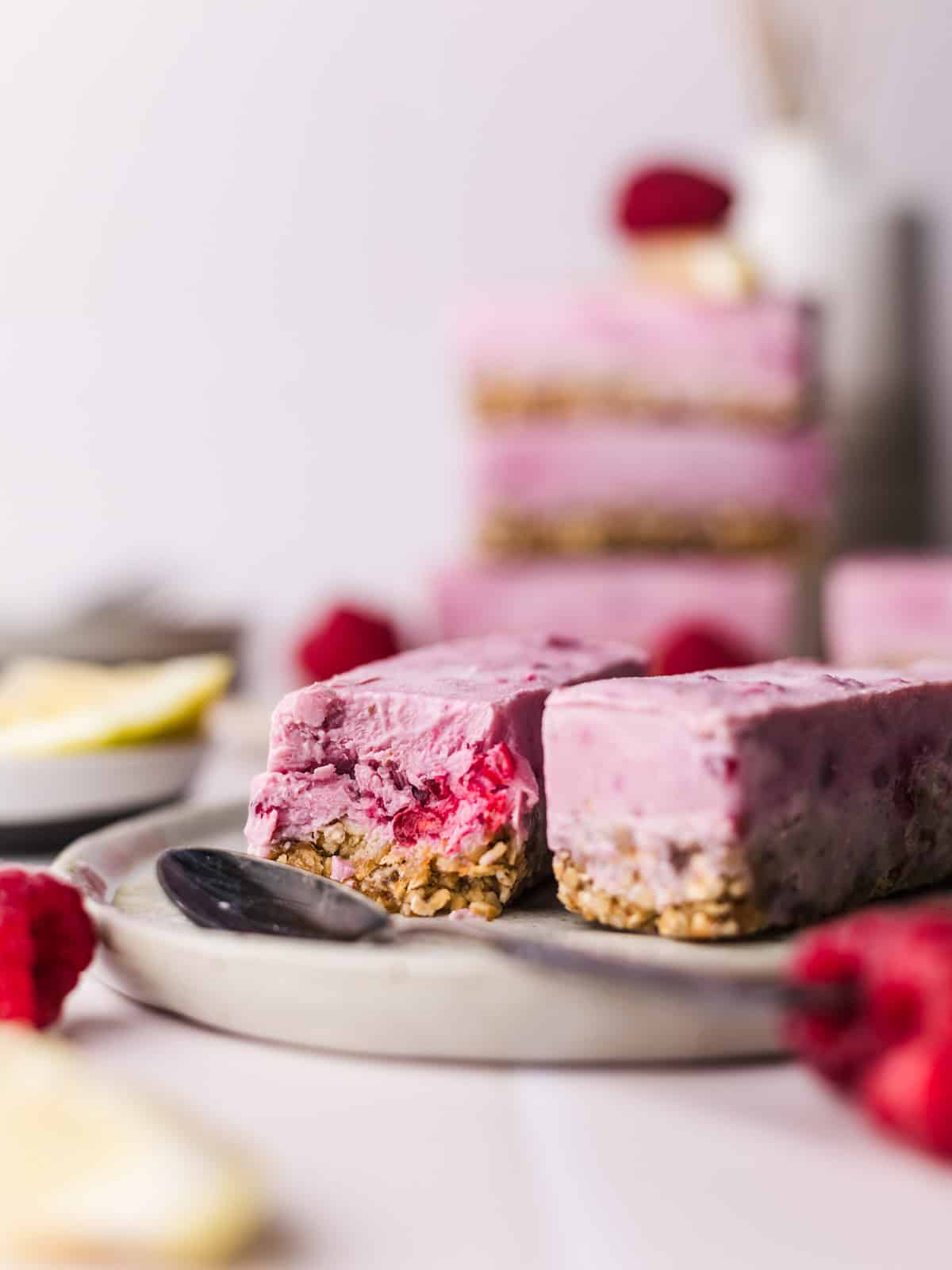 Vegan raspberry ice bars with yogurt and lemon, sliced and stacked