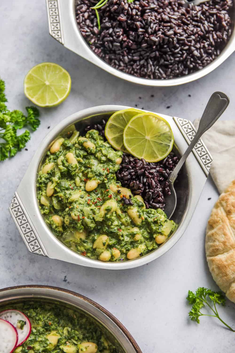 curried spinach and beans on rice