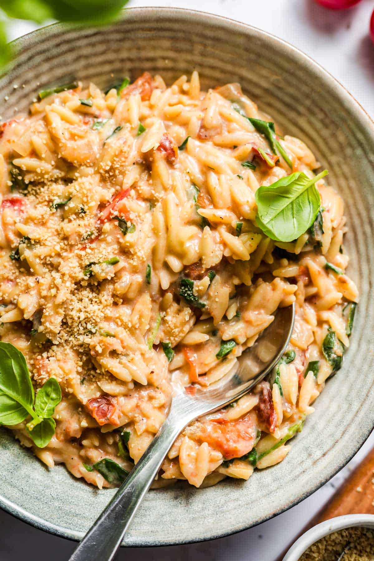 wfpb creamy vegan tomato orzo with vegan parmesan and basil