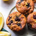 vegan blueberry lemon muffins without sugar seen from above with lemon slices