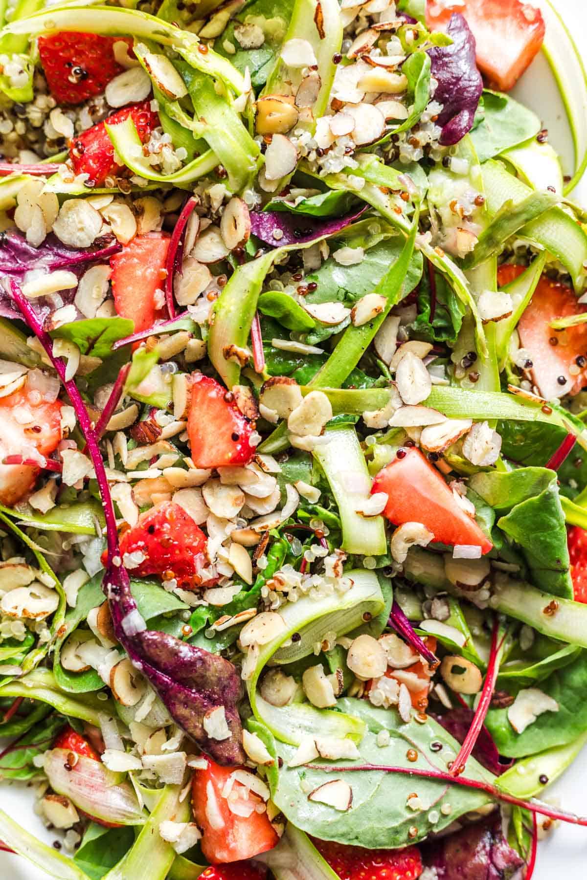 Vegan strawberry asparagus salad on a plate