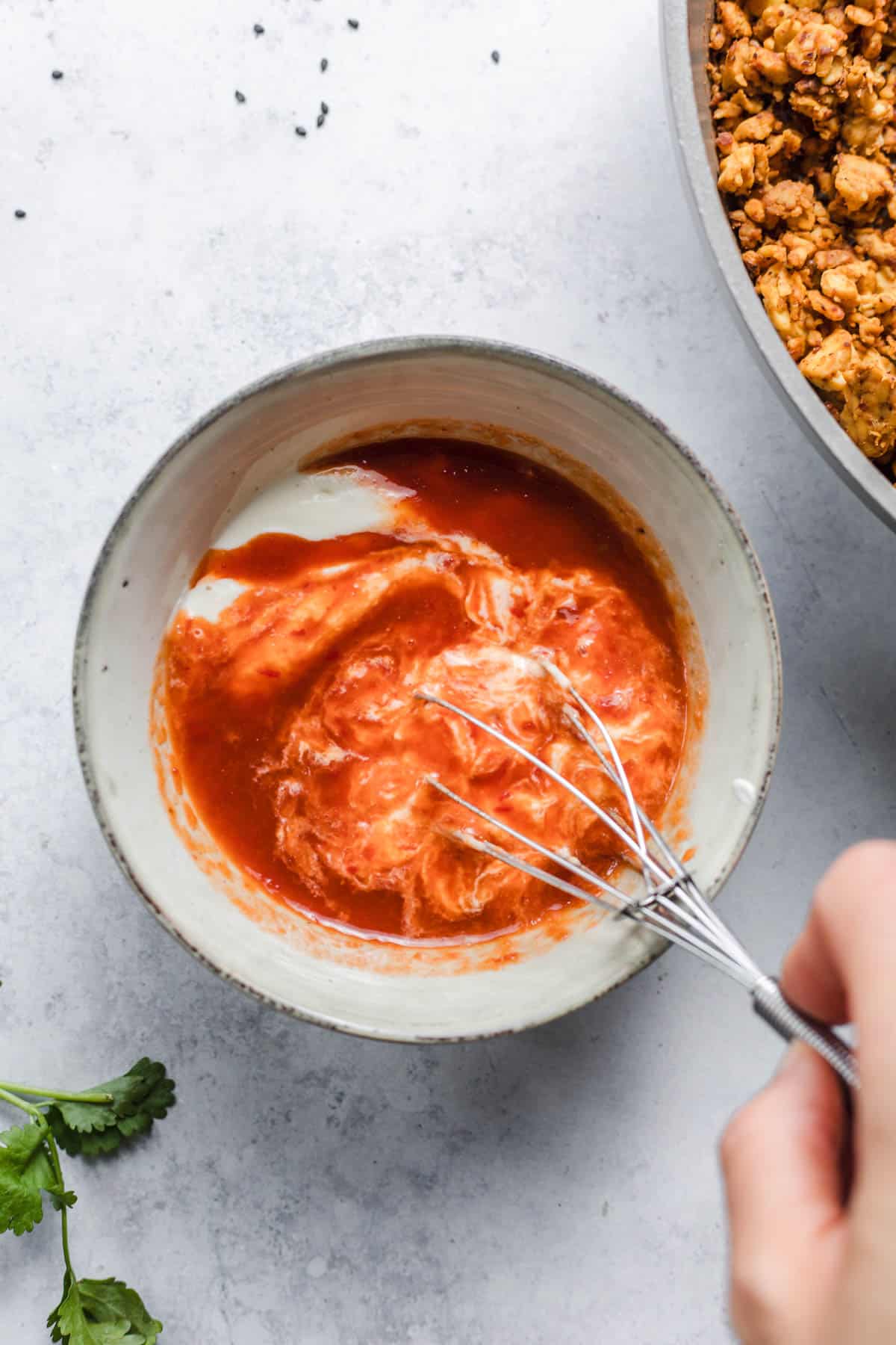 Homemade vegan bang bang sauce with sriracha and vegan mayonnaise