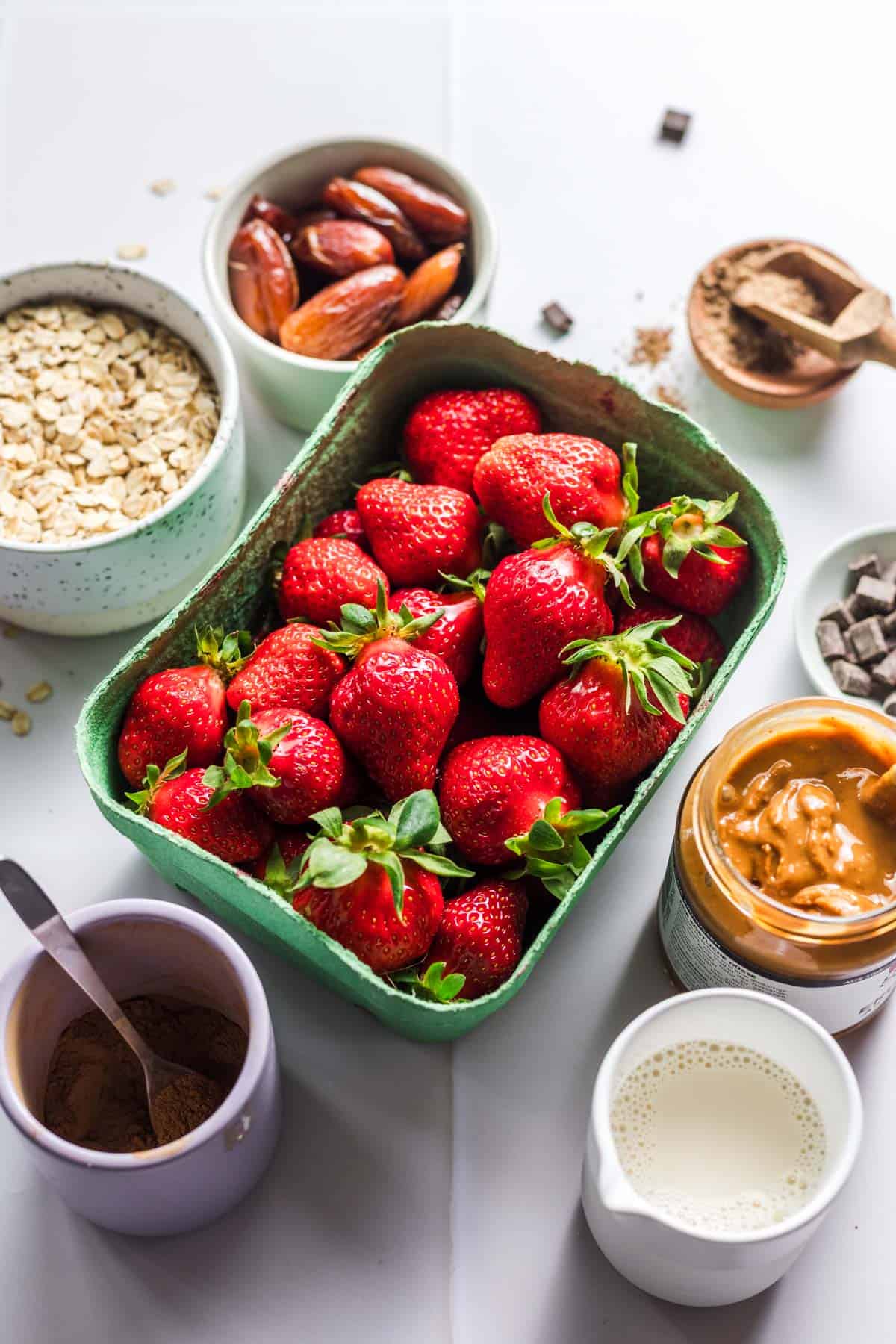 Ingredients for strawberry oat breakfast muffins without sugar