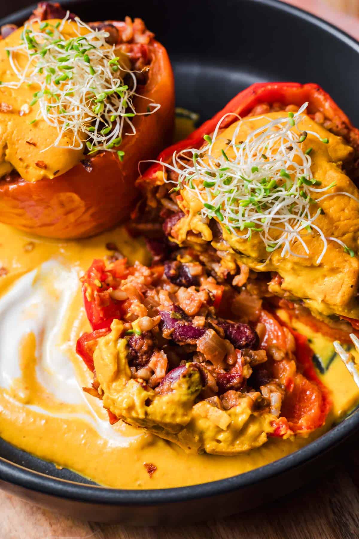 Healthy vegan stuffed peppers with rice and kidney bean filling