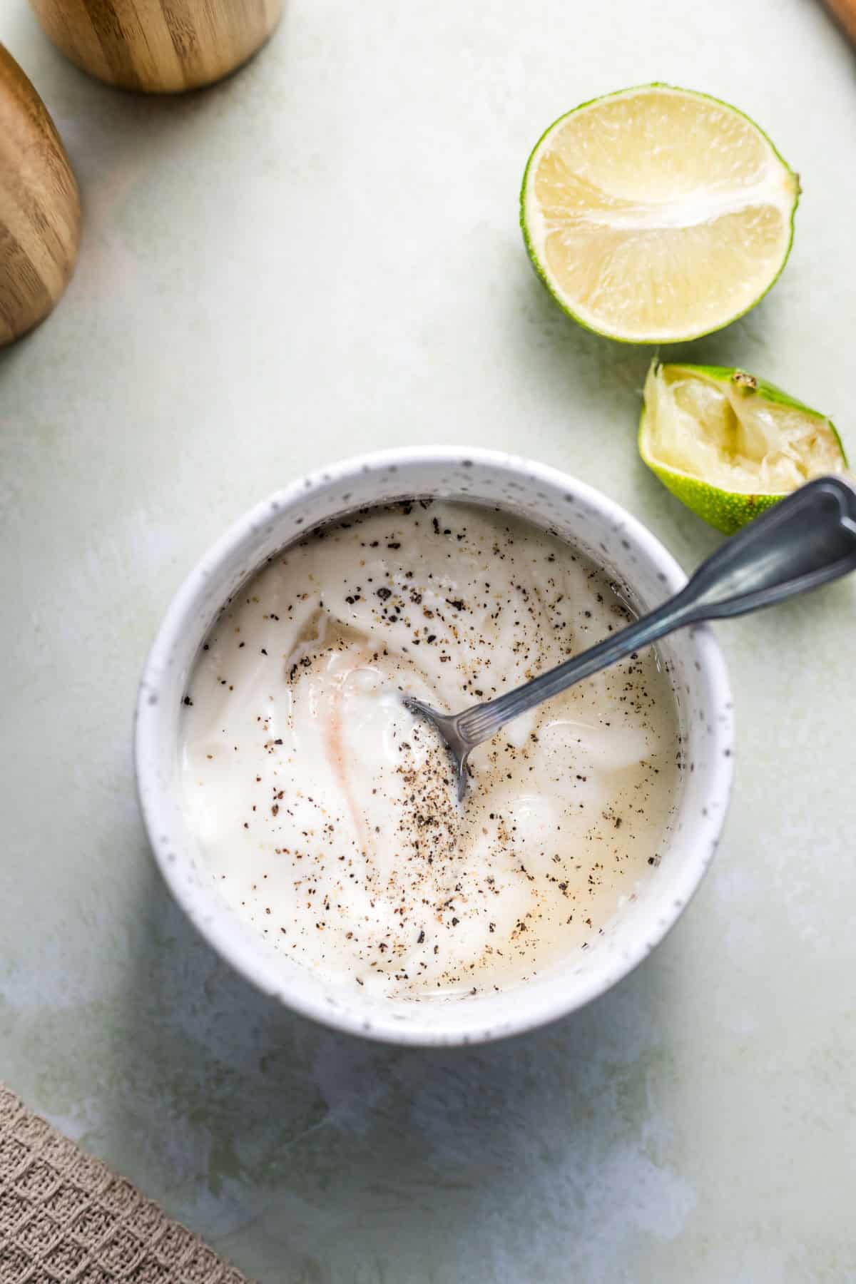 Vegan yogurt sauce stirred together in a small bowl