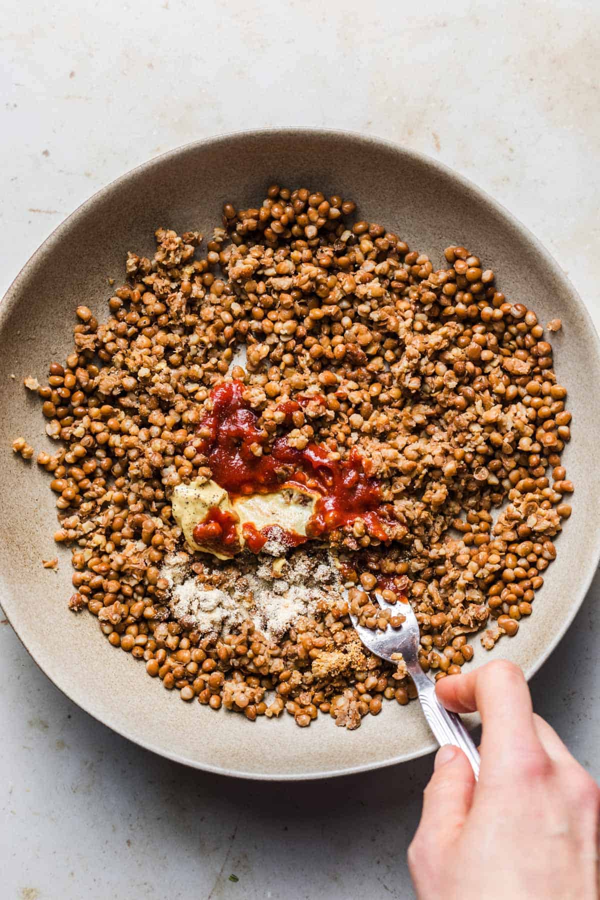linsen verrührt mit ketchup und gewürzen